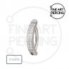 Piercing de ombligo en forma ovalada con circonitas brillantes