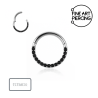Aro clicker de titanio con circonitas negras modelo Morgana.